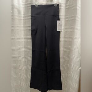 Athleta salutation stash rib flare pants black NWT